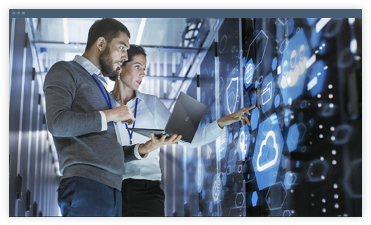 Laptop is showing two employees are discussing